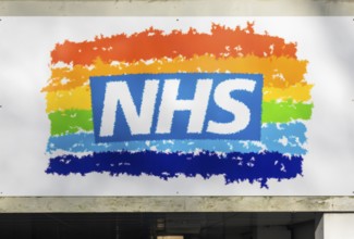 NHS rainbow logo above an entrance, Royal Berkshire hospital, Reading, Berkshire, England, UK