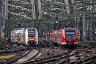 Rail system in front of Cologne Central Station, Hohenzollern Bridge across the Rhine, RRX,