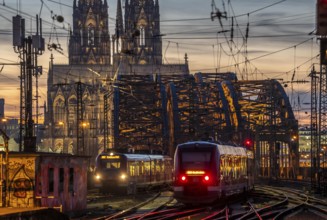 Rail track in front of Cologne Central Station, Hohenzollern Bridge across the Rhine, regional