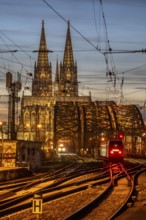Rail track in front of Cologne Central Station, Hohenzollern Bridge across the Rhine, regional