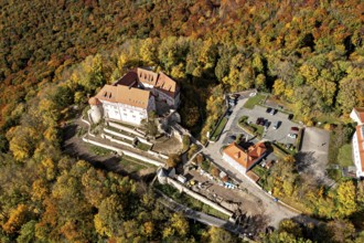 Castle complex surrounded by autumn forest, aerial view of the countryside, Bodenstein Castle in