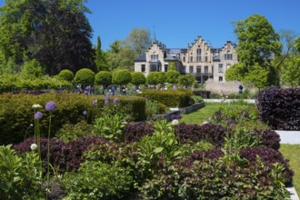 Blooming gardens at Ippenburg Castle, Bad Essen, Lower Saxony, Germany