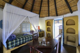 Round cabin, guest accommodation, Planet Baobab, lodge near the village of Gweta, interior view,