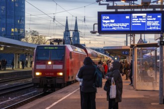 Long-distance train and regional train at Cologne-Messe/Deutz station, 2nd largest station in
