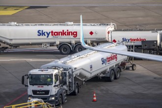 Refueling an aircraft after landing, in front of takeoff, air fuel, kerosene, Skytanking tank truck