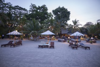 Restaurant on Sanur beach in the evening, Bali, Indonesia