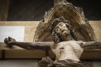 Christ sculpture from the former monastery church of S. Johannes Baptistam above portal of the