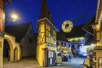 Houses illuminated and decorated for Christmas, Christmas market, blue hour, Eguisheim, Haut-Rhin