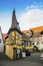 Christmassy decorated houses and alley with half-timbered houses, Christmas market, Eguisheim,