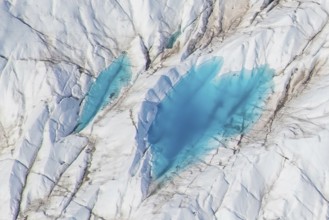 Aerial view of meltwater on the Greenland ice sheet, Arctic landscape, frozen wilderness, glaciers