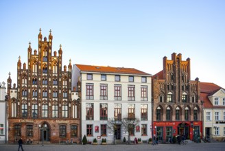Historic brick Gothic buildings on the market square of the Hanseatic City of Greifswald,