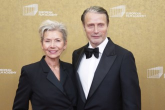 Mads Mikkelsen with woman Hanne Jacobsen, EUROPEAN FILM AWARDS Berlin 2026, photo call at the House