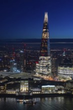 The Shard, pyramid-shaped skyscraper and London Bridge Station along the River Thames in Southwark