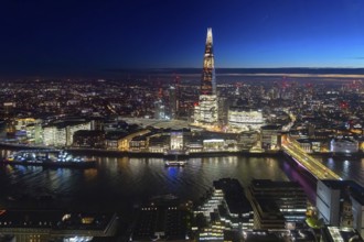 The Shard, pyramid-shaped skyscraper and London Bridge Station along the River Thames in Southwark