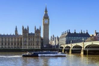 Uber Boat river bus by Thames Clippers on River Thames, Westminster Bridge, Elizabeth Tower, Big