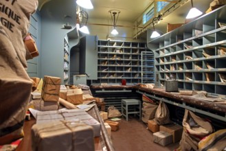 Interior of Belgian postal carriage for transporting and sorting mail at Train World, railway