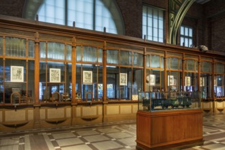 Former ticket hall with ticket counters and offices of the Schaerbeek railway station at Train