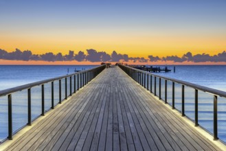 Seebrücke, pier with wooden deck made of azobe, bongossi hardwood at seaside resort Scharbeutz