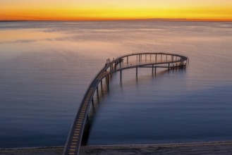 Aerial view over Maritim Seebrücke / maritime pier over the Baltic Sea at seaside resort