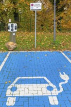 Parking area with empty public charging station / loading point from KEBA, network of chargers for