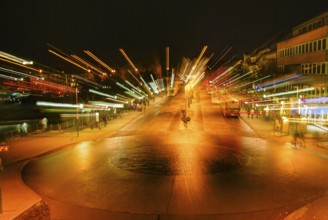 Nocturnal bus station with zoom effect, downtown Reutlingen, Baden-Württemberg, Germany
