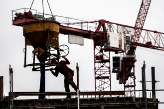 Construction site, concreting work, on a large construction project, apartments and commercial