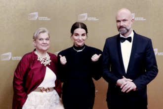 Ada Soomon, Juliette Binoche and Matthijs Wouter Knol arriving at the European Film Awards at the