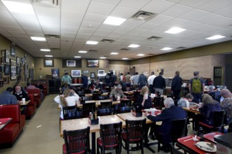 Guests at a retro restaurant serving traditional food in Nashville, Nashville, Tennessee, USA
