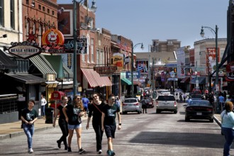 Lively walk by people on the famous Beale Street in Memphis, Memphis, Tennessee, USA