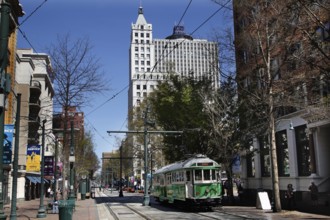 Nostalgic streetcar runs down South Main Street in Memphis, Memphis, Tennessee, USA