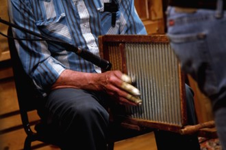 Musician playing a washboard at the night event at Floyd Country Store, null