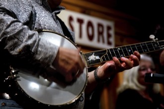 Close-up of a banjo player at the Night Jamboree at Floyd Country Store, null