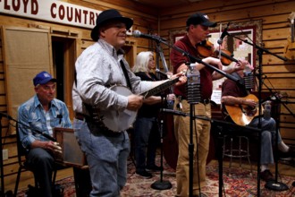 A band plays country music at Floyd Country Store during a night jamboree, Floyd, Virginia, USA