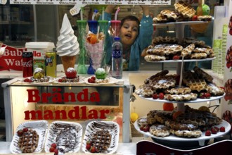 Candy shop in Gamla Stan with pastries and sweet treats in the shop window, Stockholm, Gamla Stan,