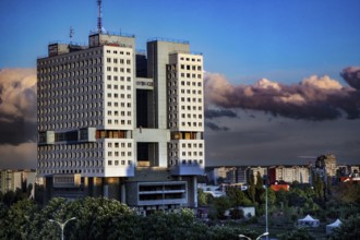 Modern high-rise building against dramatic cloudy sky, Kaliningrad, Russia