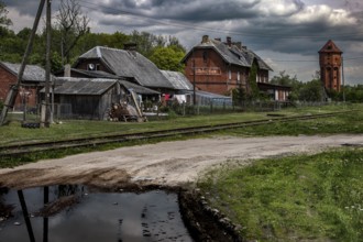 Historic train station in a quiet rural setting with dramatic skies, Cistye Prudy, Kaliningrad,