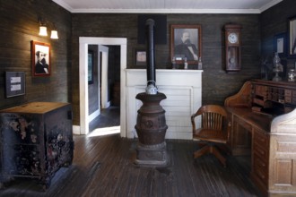 Office with antique furniture and a fireplace at Jack Daniel's Distillery, Lynchburg, Tennessee,