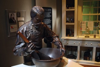 Figure of John Pemberton working on a large mixing bowl in the museum, Atlanta, Georgia, USA