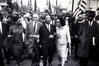 Martin Luther King Jr. leads a protest march with a large crowd, Atlanta, Georgia, USA