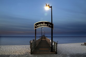 The Biloxi pier at dusk with a view of the ocean, Biloxi, Mississippi, USA