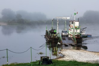 Ferry in thick fog on the Nemunas river near Vilkija, Vilkija, Lithuania