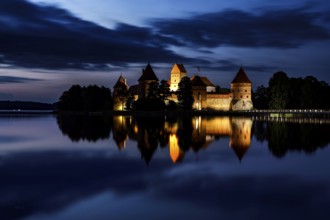 Atmospheric night view of Trakai Castle with reflection, Trakai, Vilniaus Apskritis, Lithuania