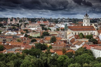 View of the old town of Vilnius from Gediminas Hill with dramatic clouds, Vilnius, Lithuania
