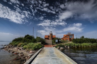 Lighthouse and buildings on the coast under cloudy sky, Windenburg, Vente, LT