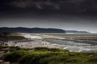 Waves break on Ventspils beach under a cloudy sky, Ventspils, Latvia
