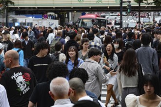 People of various ages cross the Shibuya Intersection in Tokyo, Tokyo, Shibuya, Japan