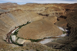 Impressive geological formations in the Dadès Canyon with a river, Dadès Gorge, Morocco