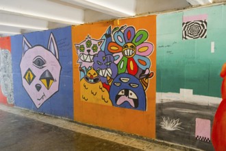 Colourful graffiti full of pop cultural elements and creative, surreal representations, underground