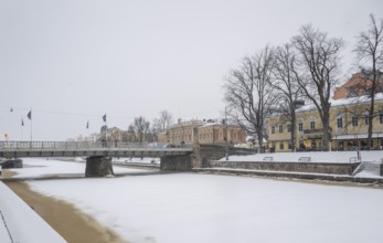 Auransilta bridge crossing the Aurajoki river, winter Turku or Swedish Åbo, Varsinais-Suomi,