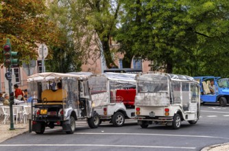 Typical TukTuk in road traffic in Sintra, Lisbon, Portugal